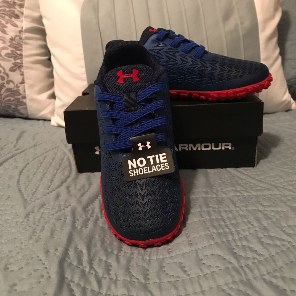 Boys under armour no tie shoelaces shoes.